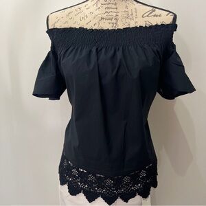 Women’s Who What Wear black off the shoulder top in size X-Small.